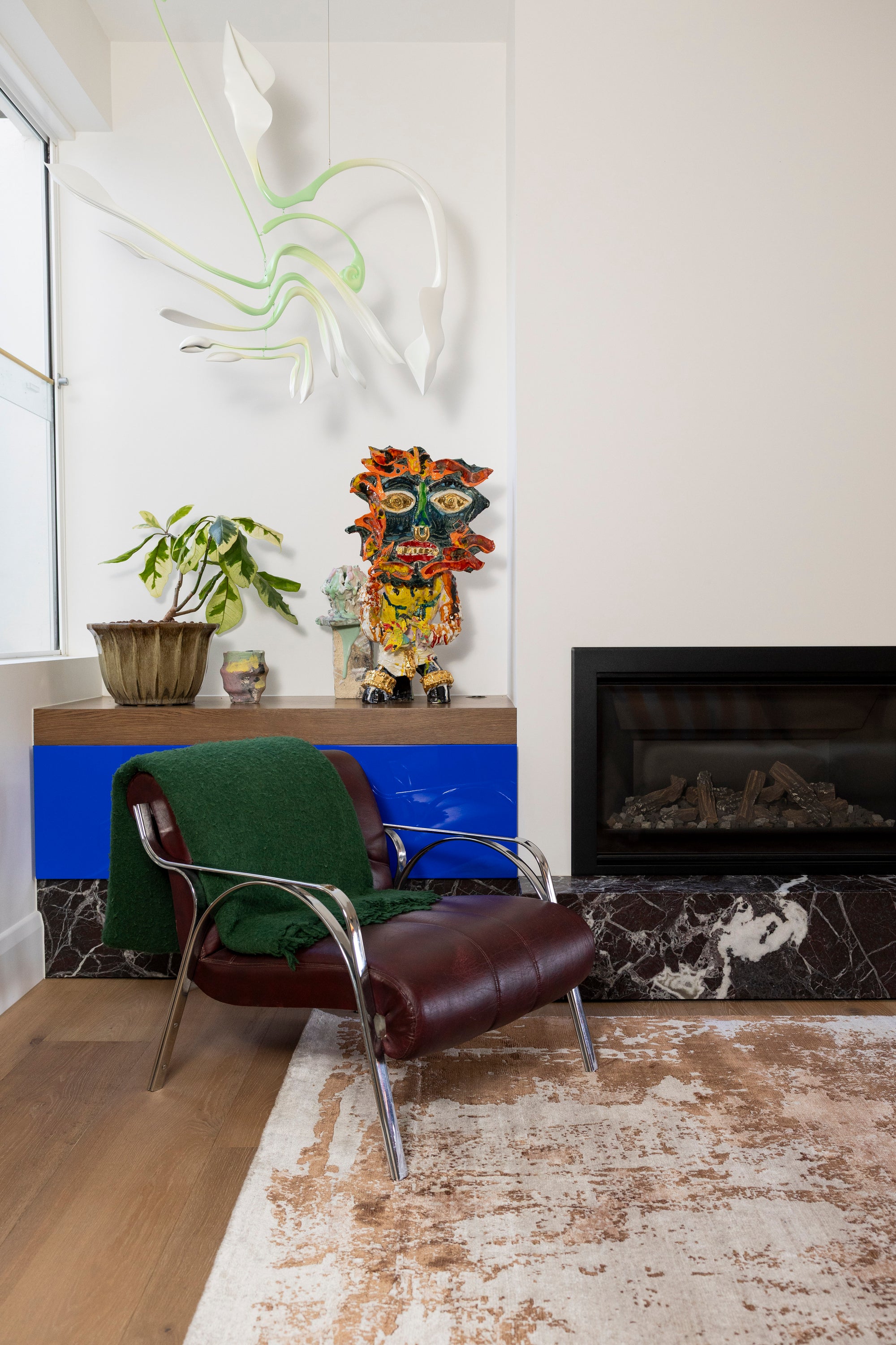 Modern interior with Blush Shadow Pink and Rust Rug By Four Corners Rugs
