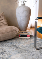 Large textured vase in a living room setting with Cooper Plush Rug by Four Corners Rugs