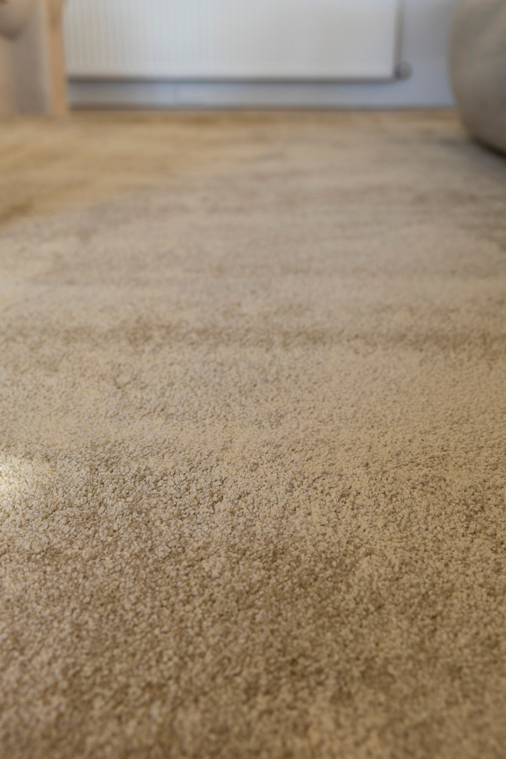 Close-up of Plush Gold Rug by Four Corners Rugs