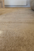 Close-up of Plush Gold Rug by Four Corners Rugs