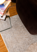 Close-up of Python Natural Base Rug by Four Corners Rugs