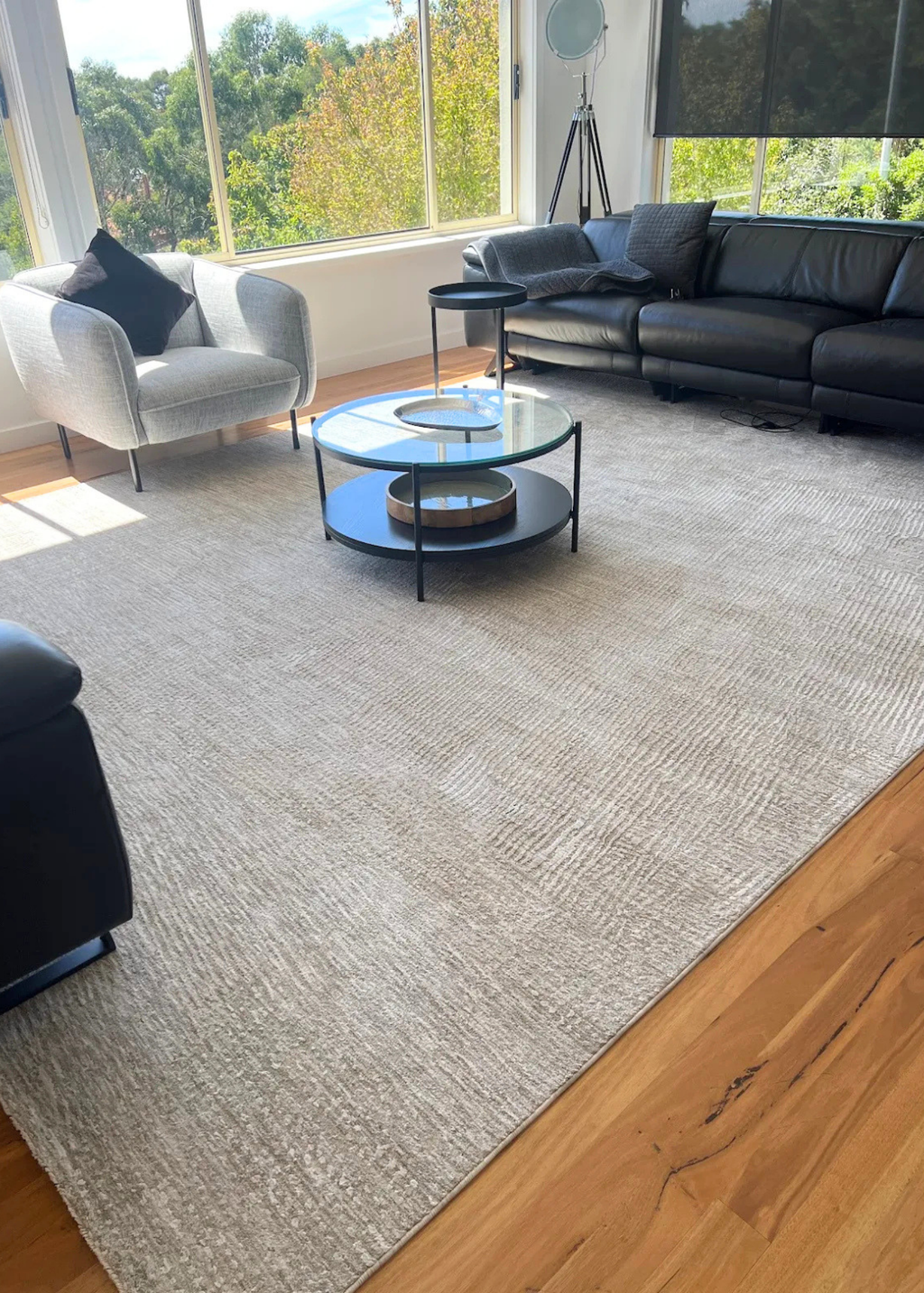 Customer home featuring Trinity Grey and Warm Tone Rug by Four Corners Rugs