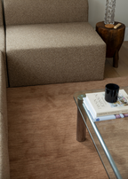 Brown sofa and glass coffee table with Wool Texture Teddy Brown Rug 